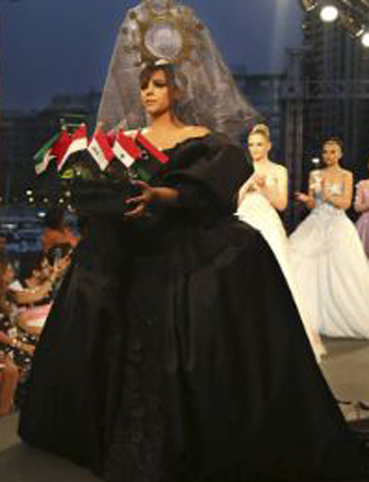 رويدا المحروقي تعرض ثوب زفاف أسود اللون