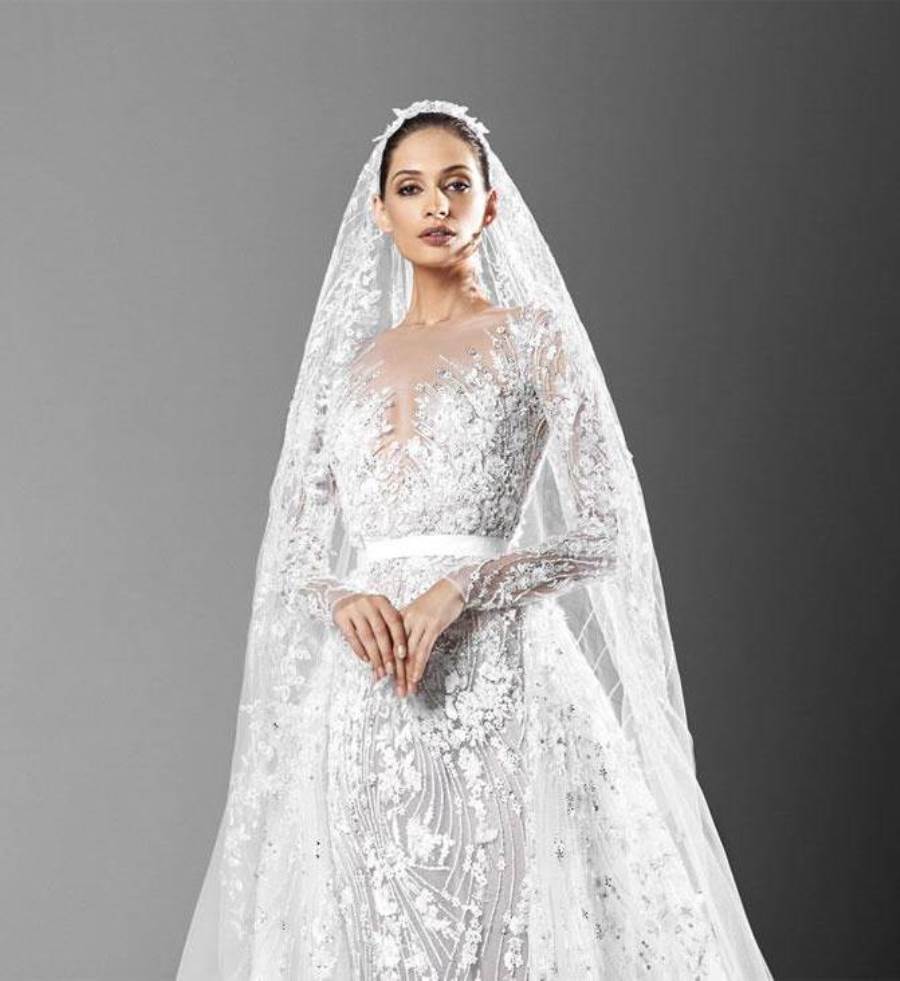 كوني كالأميرات وتألقي بأحد تصاميم Monique Lhuillier لفساتين زفاف ربيع وصيف 2013