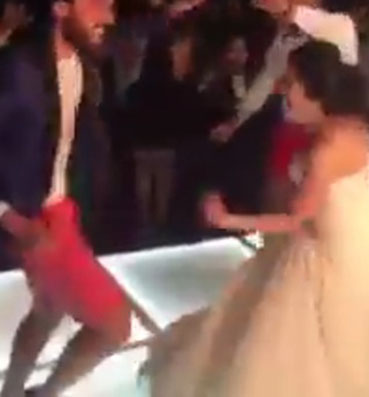 بالفيديو .. عريس يفاجئ حبيبته بـ"شورت" في حفل الزفاف