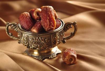 بائعو التمور في مصر يطلقون عليها في رمضان أسماء مشاهير الكرة