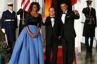 ميشيل أوباما تغطي ذراعيها بـ 12 ألف دولار