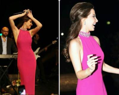 نانسي عجرم تنير سماء باريس باللون الفوشي