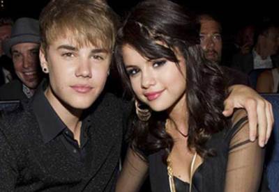  بالصور .. "جاستن بير" يرقص لـ "جوميز" عقب عودتهما