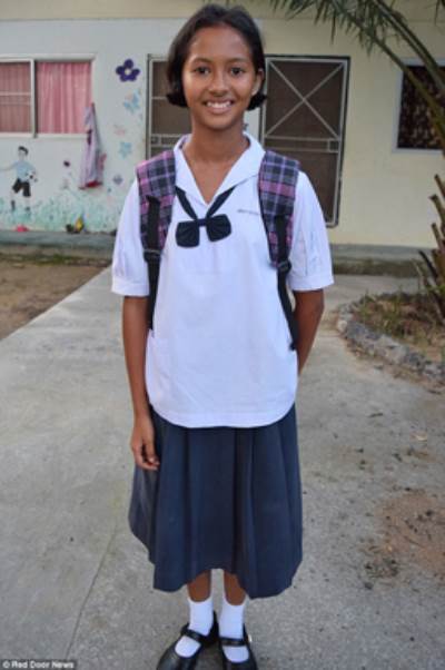 صور طفلة تايلندية فقيرة ترفض أن تتبناها كيم كارداشيان والسبب