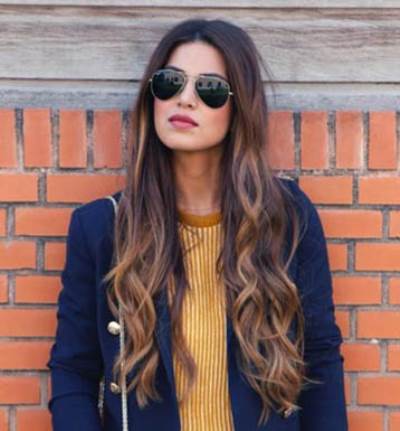 بالصور .. من هي صاحبة أجمل شعر في العالم؟