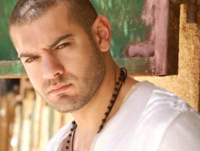 عمرو يوسف يدخل سباق رمضان 2015 بـ "ظرف أسود"