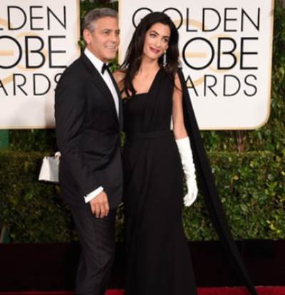 صورة جورج كلوني وأمل علم الدين على سجادة الغولدن غلوب الحمراء تنفي شائعات الطلاق