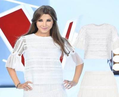 شاهد إطلالة نانسي عجرم بالتنورة البيضاء و"البوت"