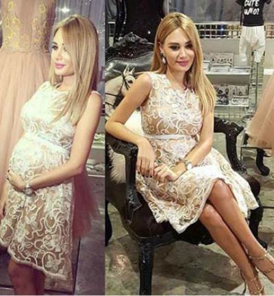 بالصور .. زوجة رامي عياش تستعرض حملها بفستان شفاف