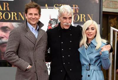 ليدى جاجا وبرادلى كوبر يدعمان سام اليوت خلال وضع بصماته باللوح الأسمنتى