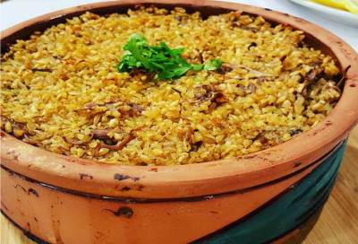 "طريقة عمل طاجن "الفريك بالكبد والقوانص