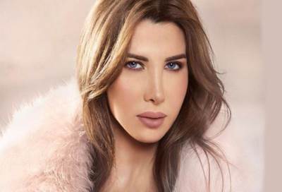 نانسي عجرم "تسقط " على المسرح