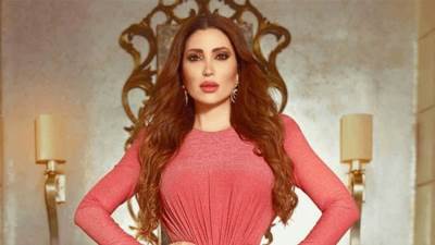 نسرين طافش تتألق بالفستان الأحمر