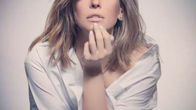 بالأبيض والأسود .. إيمان العاصي تنشر صورة جديدة لها 