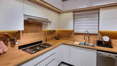 ما هي أنواع "الكلادينج" في ديكورات مطابخ المنازل العصرية؟