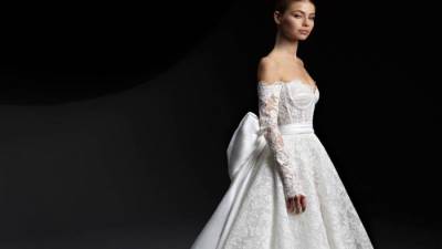  موديلات فساتين زفاف مزينة بالفيونكات الكبيرة 2024