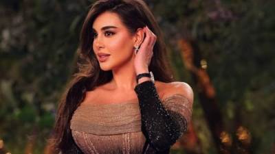 ياسمين صبري تتألق بساعة ماسية شوبارد في حفل Joy Awards